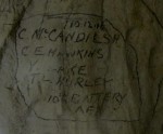 Hawkin's name scratched into the cave walls at Naours.  Courtesy Gilles Prilaux